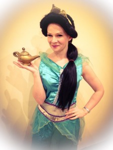 A lady dressed as Princess Jasmine holding a genie lamp