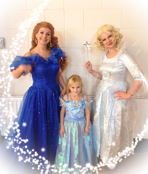 Blue ball gown Cinderella entertainer and her Fairy Godmother with a little girl